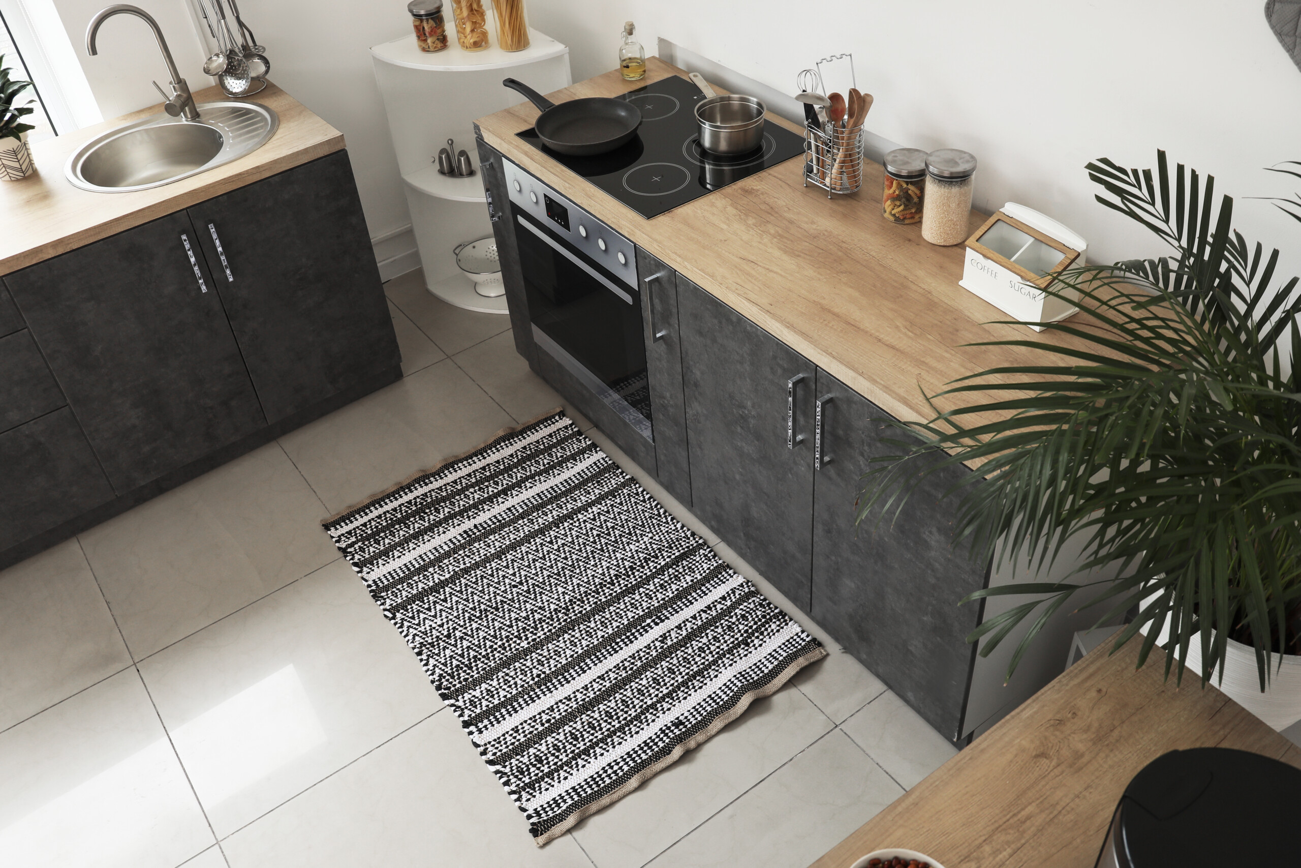 small rug in front of kitchen sink